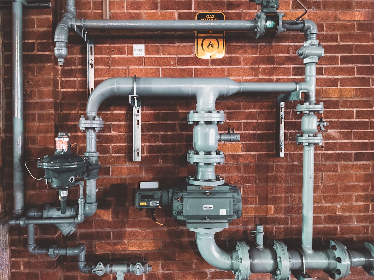 Licensed plumber working on residential pipes